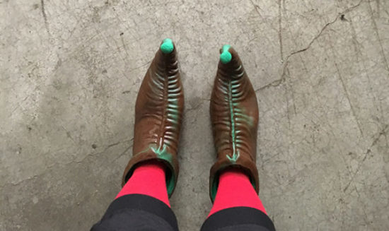 Elf shoes on concrete floor