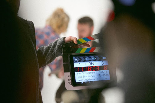 someone holding a clapperboard